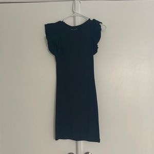 ADORABLE black little dress with a ruffle in the sleeve!!